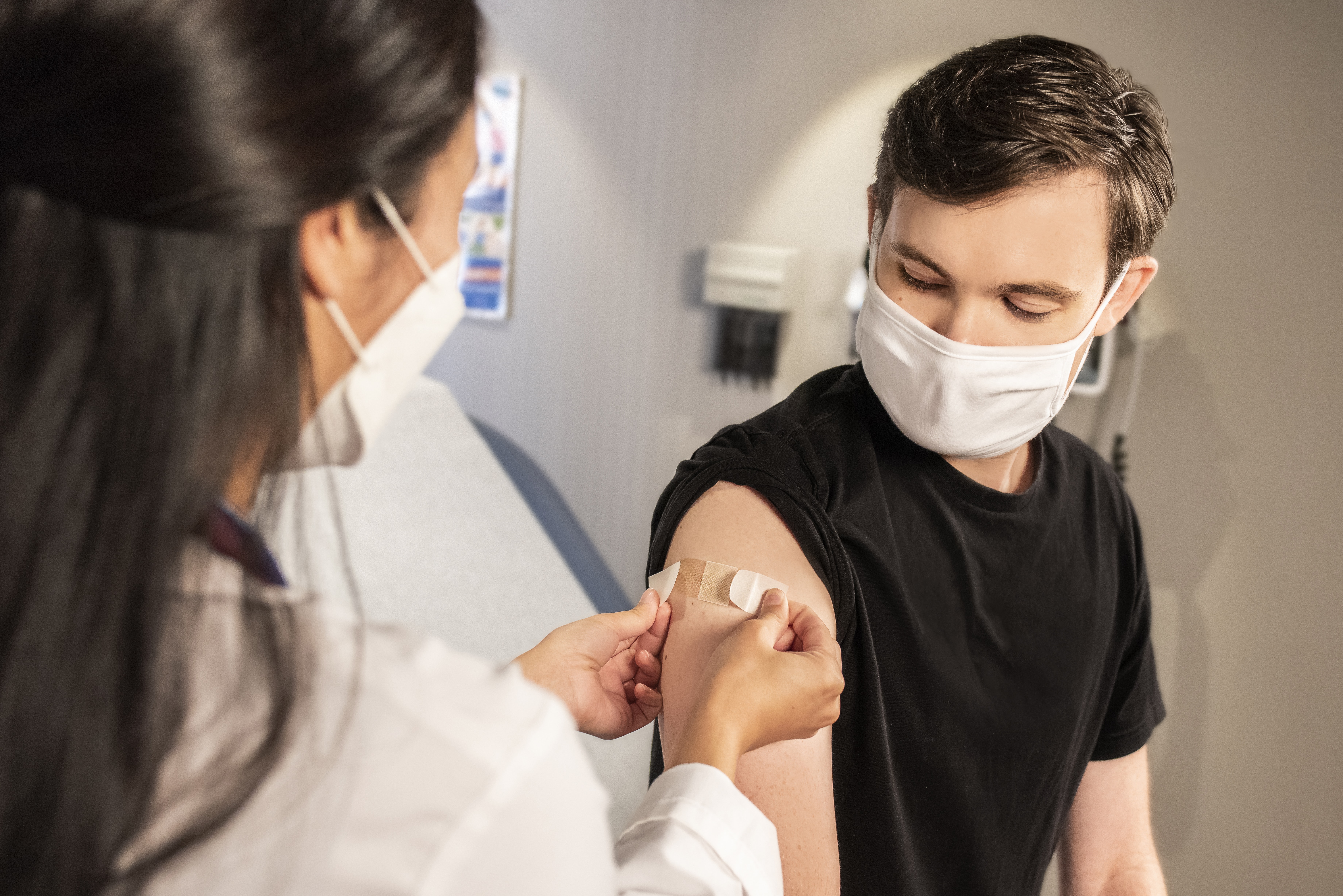 Person receiving a vaccine